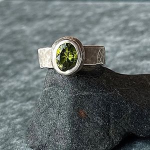 Brilliant cut Kashmiri peridot ring